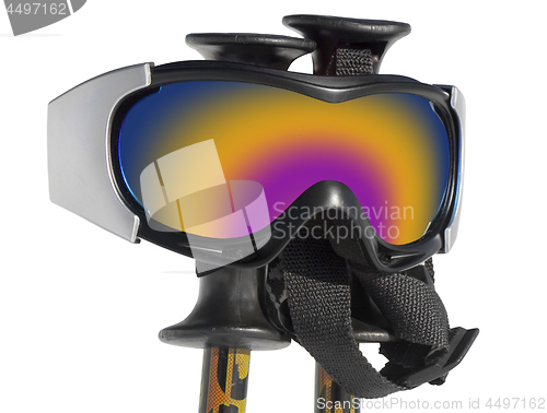 Image of Close up of the ski goggles on ski sticks isolated on white back