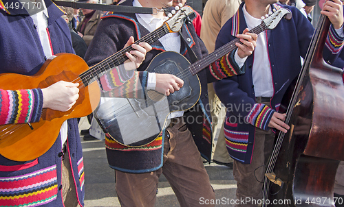 Image of Traditional Croatian musicians in Slavonian costumes play in the