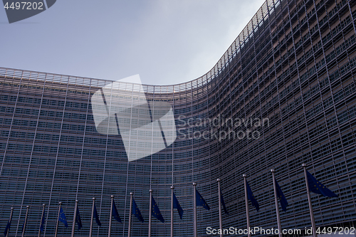 Image of European flags in front of the Berlaymont building