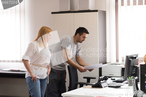 Image of designers in office at the wooden furniture manufacture