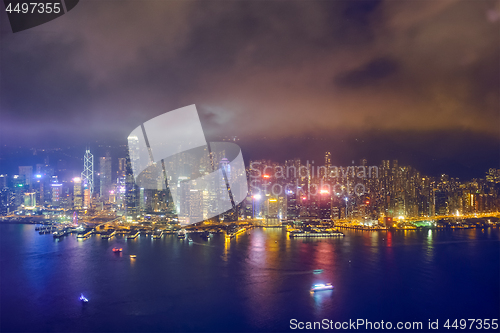 Image of Aerial view of illuminated Hong Kong skyline. Hong Kong, China