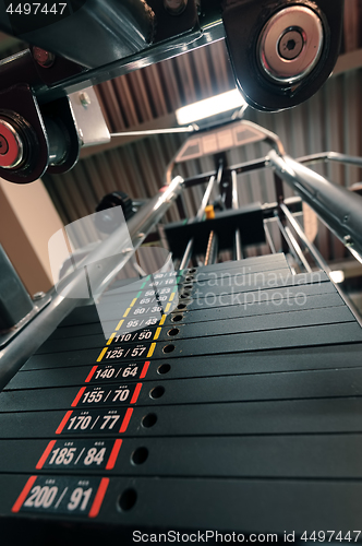 Image of Weights in gym machine