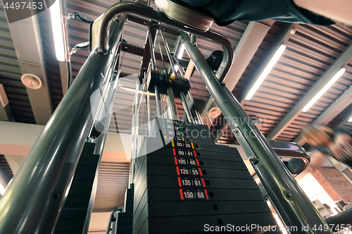 Image of Weights in gym machine