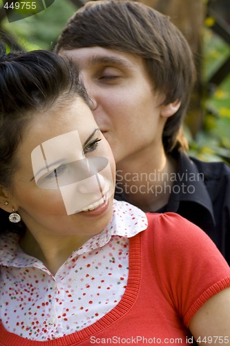 Image of loving couple kissing