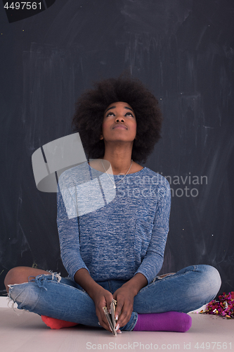 Image of African American woman isolated on a gray background