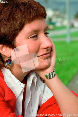 Image of  redhead woman in red