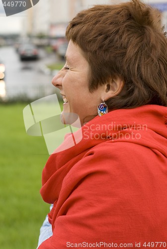 Image of laughing redhead woman