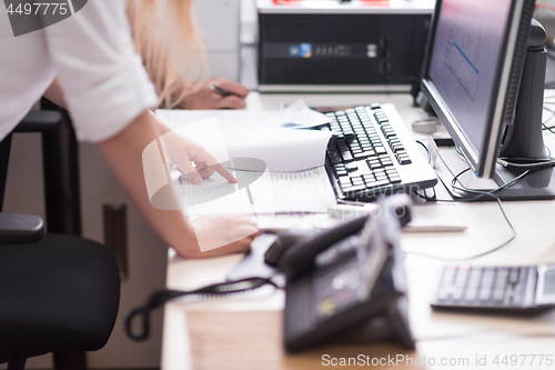 Image of designers in office at the wooden furniture manufacture