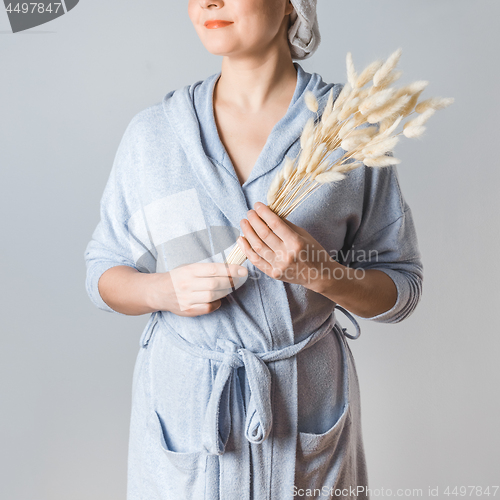 Image of Young woman after shower