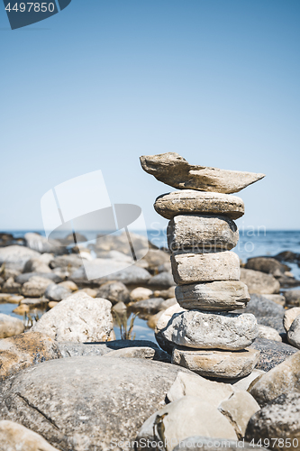 Image of Stack of stones on a rocky beach
