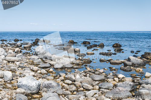 Image of Stones and blue water