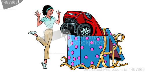 Image of car holiday gift box. African woman funny reaction joy. isolate on white background