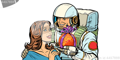 Image of Couple in love. Astronaut gives a woman Mars. isolate on white background