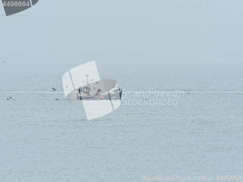 Image of Fishing Boat on Misty Day