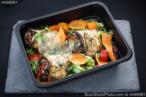 Image of Balanced box diet, grilled aubergine rolls with vegetables
