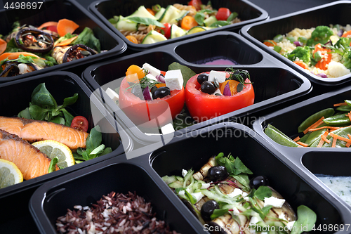 Image of Lunch boxes, delicious and healthy dinner dishes.Catering, dinner dishes in boxes.