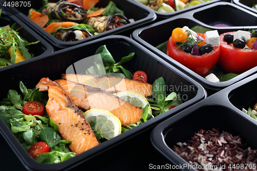 Image of Lunch boxes, delicious and healthy dinner dishes