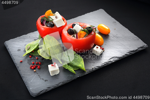 Image of Vegetable appetizer. Stuffed tomatoes.