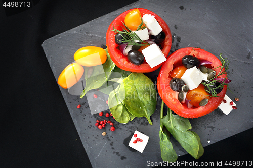 Image of Vegetable appetizer. Stuffed tomatoes.