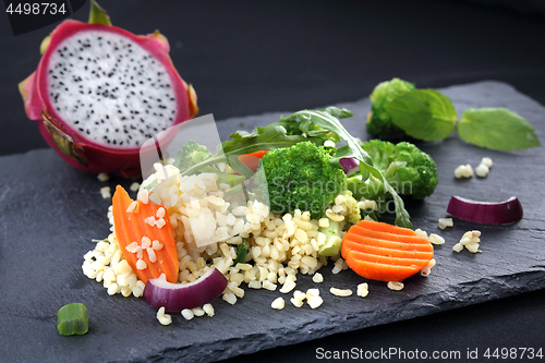 Image of Food in a slimming diet, rice with broccoli and carrots