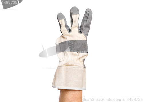 Image of Male hand wearing working glove