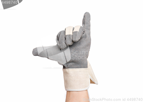 Image of Male hand wearing working glove