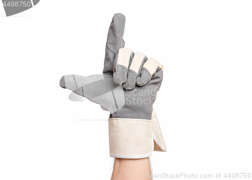 Image of Male hand wearing working glove