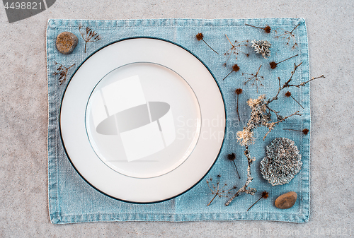 Image of Table setting decorated with Scandinavian wild plants