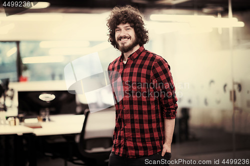 Image of Portrait of smiling male software developer