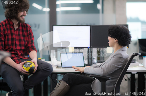 Image of software developers couple writing programming code