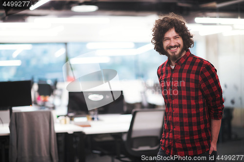 Image of Portrait of smiling male software developer