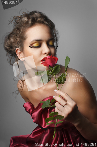 Image of Woman with rose