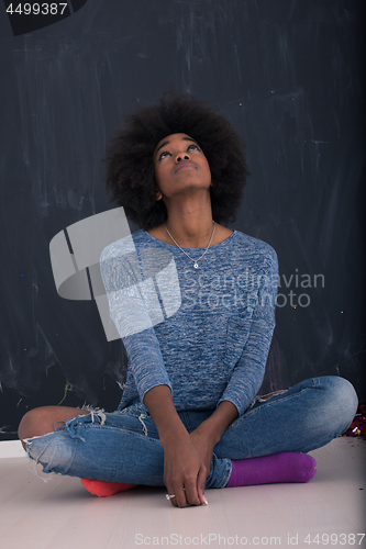 Image of African American woman isolated on a gray background
