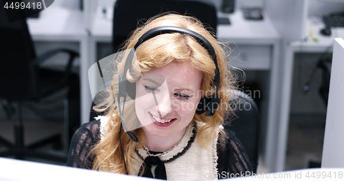 Image of female call centre operator doing her job