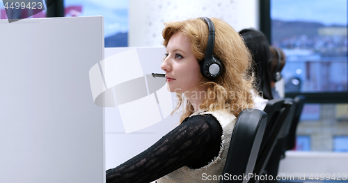 Image of female call centre operator doing her job