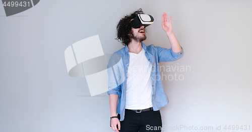 Image of Man using headset of virtual reality