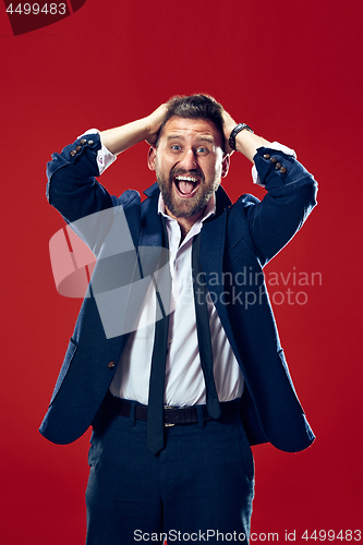 Image of Winning success man happy ecstatic celebrating being a winner. Dynamic energetic image of male model