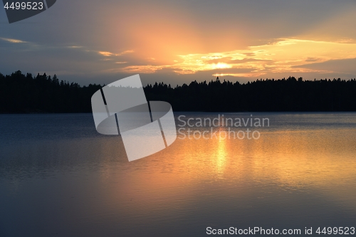 Image of sunset over the lake, landscape in Finland