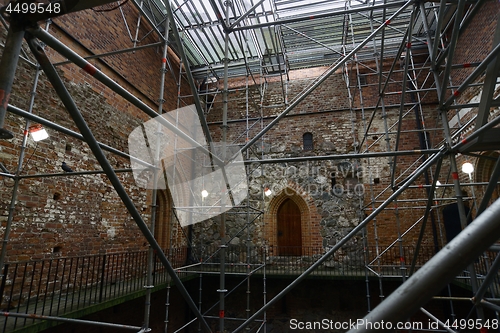 Image of restoration of the walls of a medieval castle