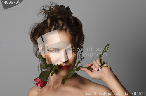 Image of Woman with rose