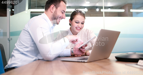 Image of Business People Working With laptop in office