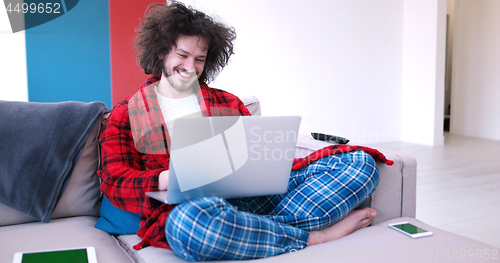 Image of man drinking coffee enjoying relaxing lifestyle