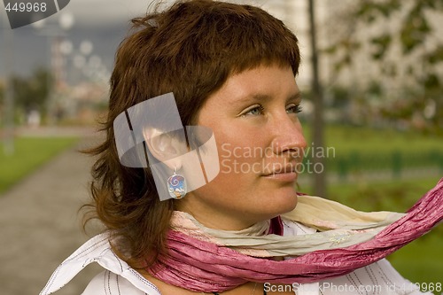 Image of redhead woman in white