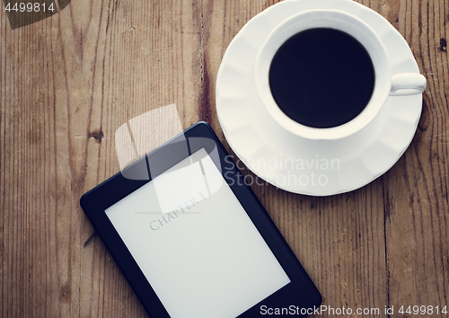 Image of E-book reader and coffee