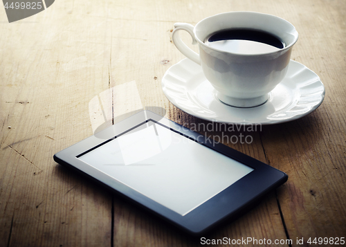 Image of E-book reader and coffee