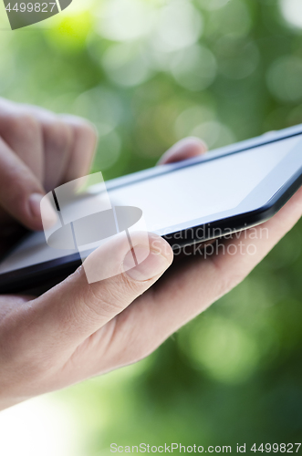 Image of Tablet in hands