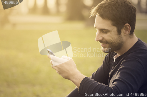 Image of Man with smart phone