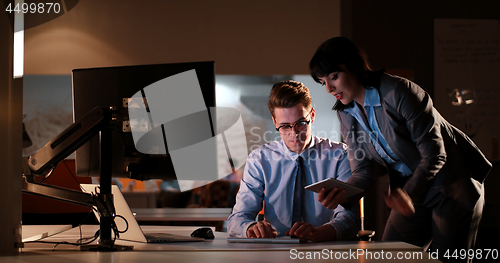 Image of young designers in the night office