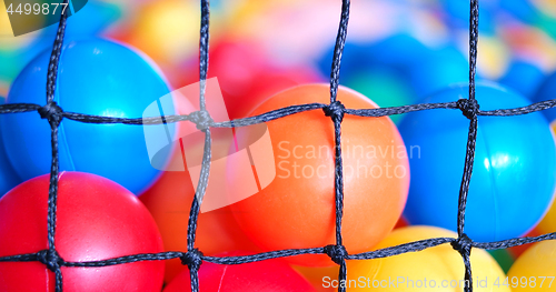 Image of Colorful plastic toy balls in the play pool