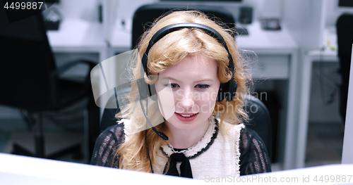 Image of female call centre operator doing her job